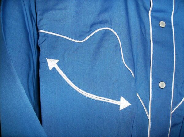 A blue shirt with white arrows on it.