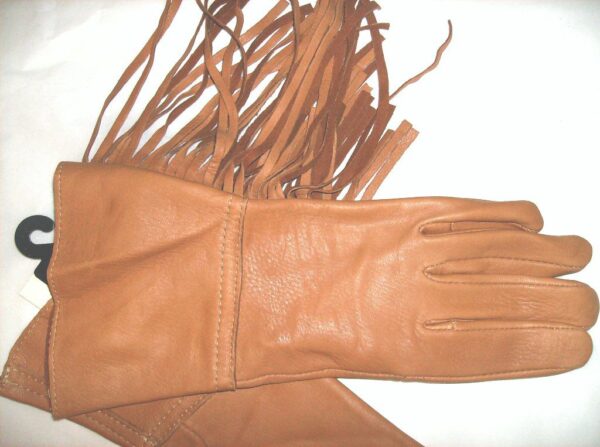 A pair of tan leather gloves with fringes.