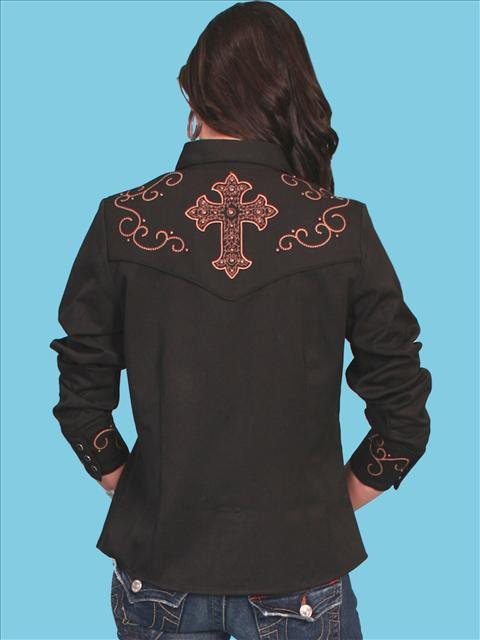 The back view of a woman wearing a black cowboy jacket with a cross on it.