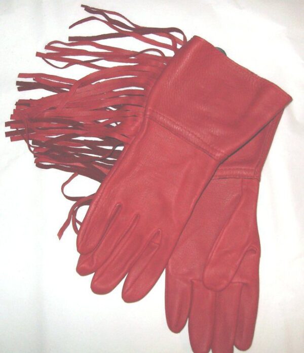 A pair of red leather gloves with fringes.