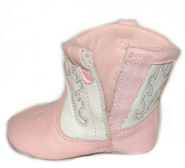 Pink and white "Up All Night" baby cowboy boots on a white background.