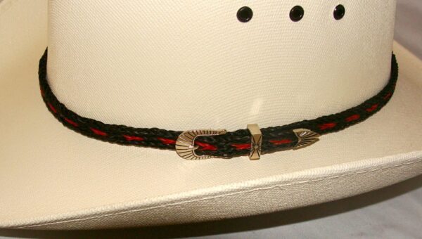 A cowboy hat with a Sterling Silver Buckle, Black & Red Horse hair hat band - USA.