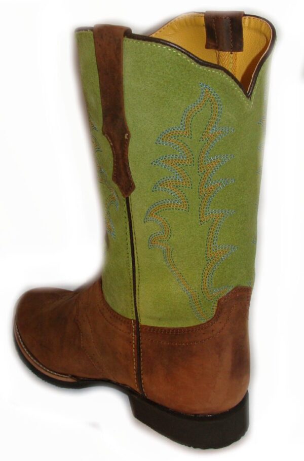 A pair of size 8.5 "Green Showdown" Distressed womens cowboy boots with brown trim.