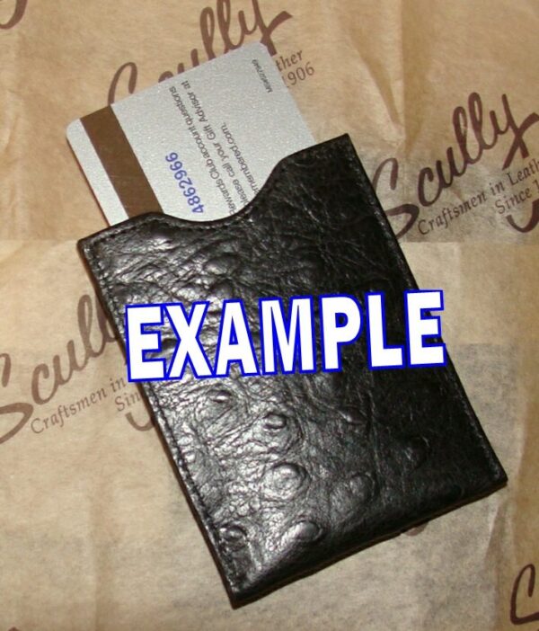 A Scully Black Italian leather magnetic money clip with the word example on it.