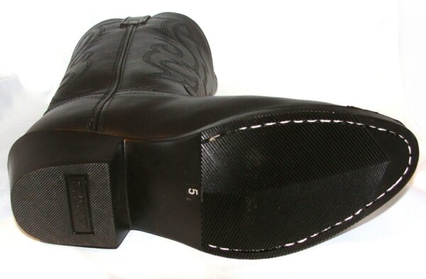A close up of a SZ: 5 "Denver" Black leather youth cowboy boot with white stitching.