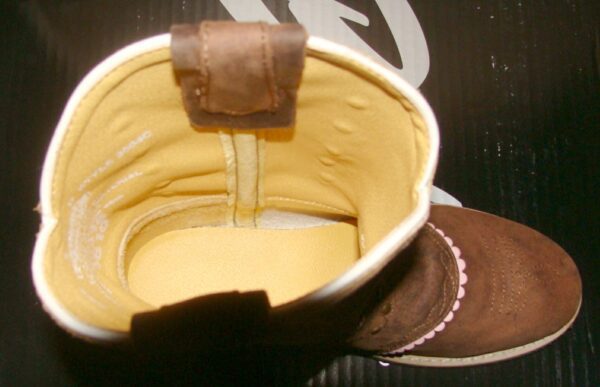 The inside of a child's Size 6.5 Youth True Timber Pink Camo Cowgirl Boots.