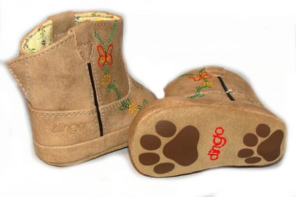 A pair of Dingo Tan Butterfly baby Cowboy boots with paw prints on them.