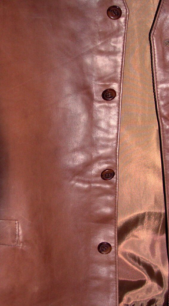 A Mens Scully Lambskin Leather Traditional Antique Western Vest with buttons.