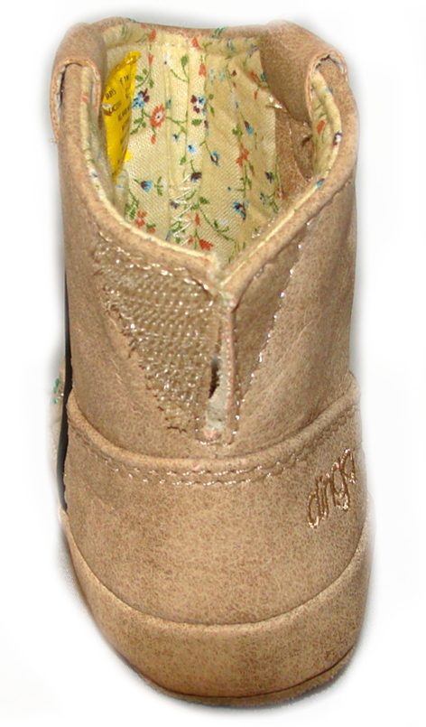 The inside of a Dingo Tan Butterfly baby Cowboy boot with a floral pattern.