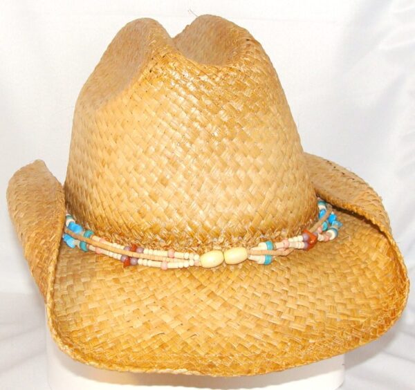 A Child "Beach Comber" Raffia Tea stained straw Jr. cowboy hat with beads on it.