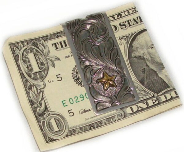 A Gold Star silver money clip with a star on top of a dollar bill.