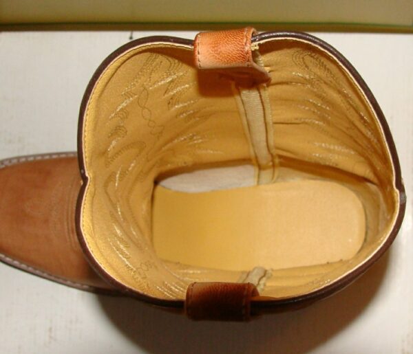 The inside of a "Pueblo" Womens 9.5 Crazy Horse Crepe Square Toe cowboy boot is shown.