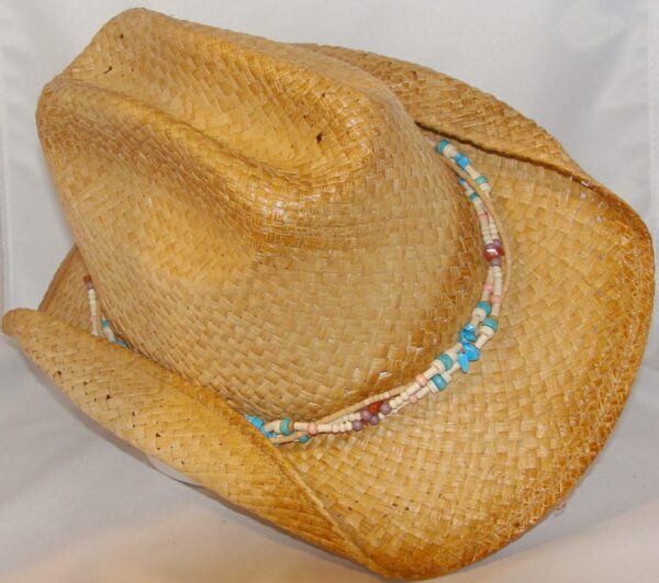 A Child "Beach Comber" Raffia Tea stained straw Jr. cowboy hat with a turquoise beaded band.