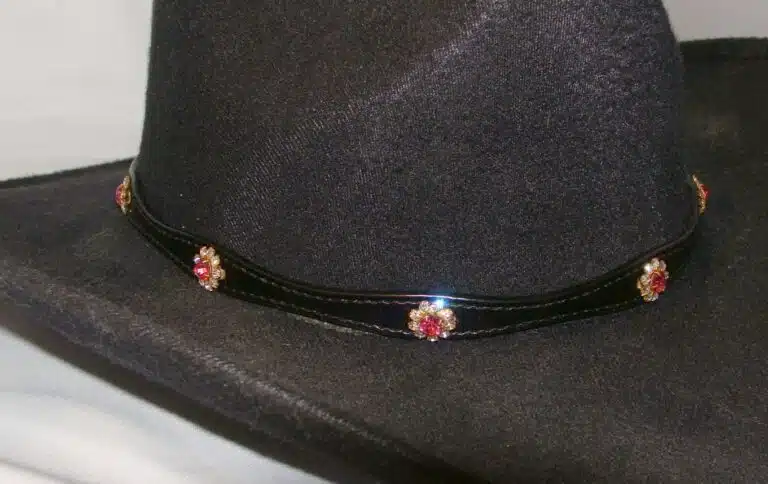 A black leather PINK Crystal Flower hat band with Silver buckle cowboy hat.