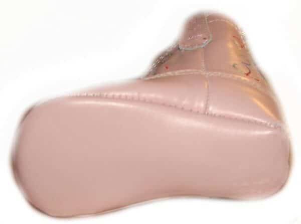 A close up of a pink leather shoe, specifically "Little Pinky" Baby Pink cowgirl boots.