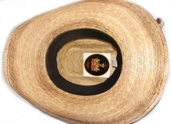 A Western Star 8-Second Toasted Guata Straw Cowboy Hat with a black label on it.