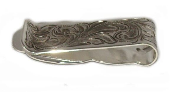 A "Sliding Stop" Cowboy Silver Western Money Clip with an ornate design.