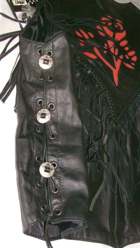 A Women's RED Rose inlay leather fringe western vest with buttons.