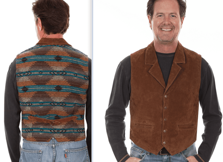 A man is wearing a Scully Mens Suede Brown Southwestern Rancher Vest with a pattern on it.