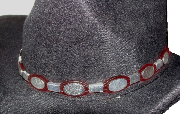 A Cherry Brown Leather Oval and Ferrules Silver Buckle Hat Band with red and silver beads on it.