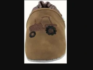 A brown WeeTractor baby bootie with a tractor on it.