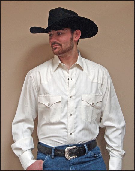 A man wearing a cowboy hat and jeans.