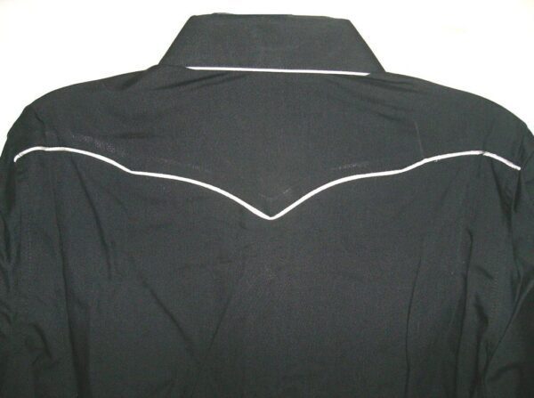 The back of a Child vintage White piped Black western shirt with white piping.