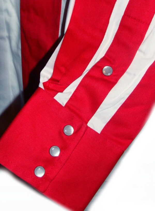A close up of a Ladies Red White, Blue American Flag pearl snap western shirt with buttons.