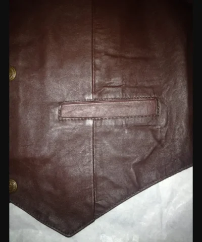 <div class="qsc-html-content"> Scully Kids Brown Lambskin leather Cowboy vest <ul> <li><strong>LAMBSKIN LEATHER</strong></li> <li>Frontal Leather, Back is satin</li> <li>Metal Snap front</li> <li>XS - XL</li> </ul> </div> •