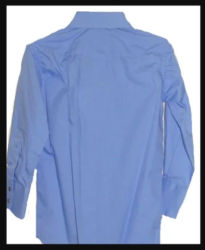 Wedgewood blue Longsleeve western shirt for the ladies. <ul> <li>Pearl snaps</li> <li>Western yoke</li> <li>65% Poly, 35% Cotton</li> <li>SIZES: L</li> </ul> •