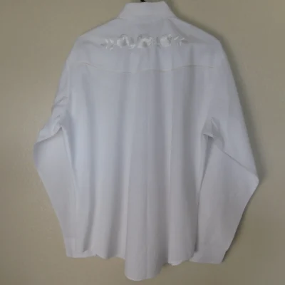 A Women's Rose Embroidered Pearl Snap White Western Shirt hanging on a hanger.