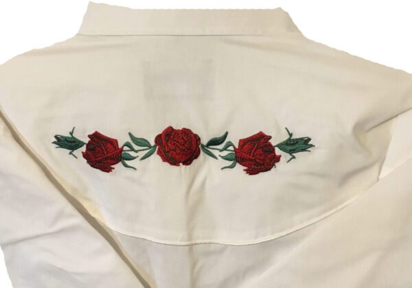 A Women's Red Texas Rose White Western Shirt with red roses embroidered on it.