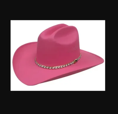 A Kids Canvas Straw Cattleman Style Hot Pink Cowboy hat on a white background.
