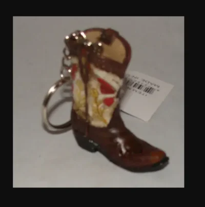 A Ceramic Single Cowboy Boot Keychain, Western Keyring with a cowboy boot on it.