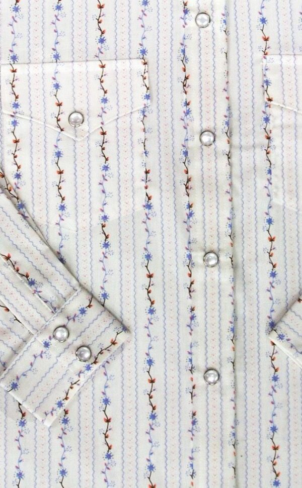 A close up of a child pink and blue floral striped western shirt.