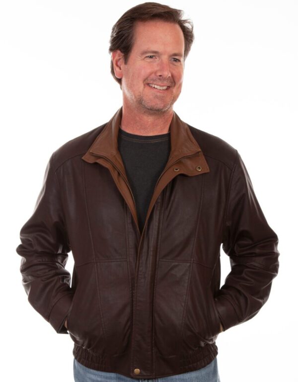 A man in a Mens Scully Cognac Featherlite Leather Double Collar Jacket.