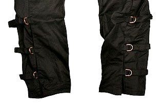 A pair of Kakadu brand Walk-A-Bout Oilskin Over Pants with buckles on them.