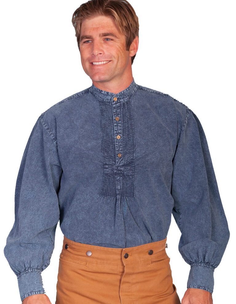 A man wearing a Mens Scully Classic 19th century Denim blue banded collar shirt and brown pants.