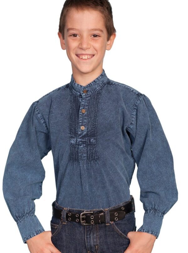 A boy wearing the Scully Rangewear Kids Denim Pleated Front Pull Over Shirt smiling at the camera.