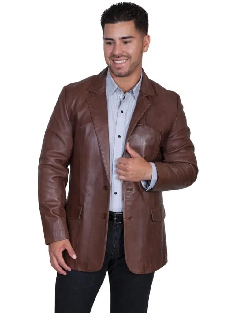 Smiling guy in a blue shirt and brown coat