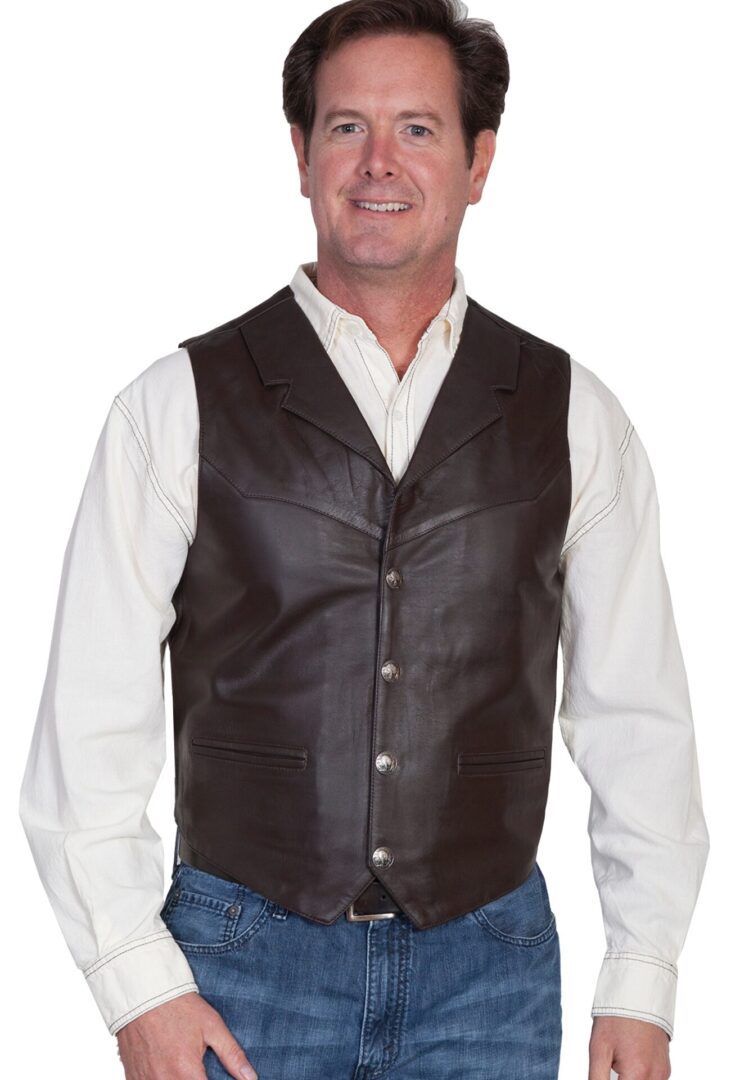 A man wearing a Mens Scully Brown Lambskin Buffalo Snap Front Western Vest.