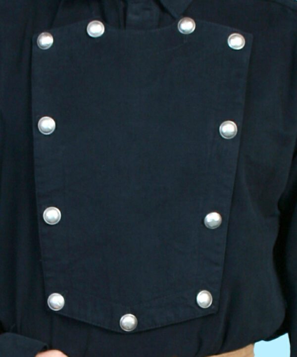 A man wearing a black shirt with silver buttons.