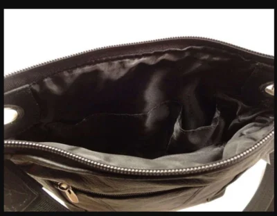 "JO" Women's Black Leather Concealed Carry Purse with Holster <ul> <li>100% Cowhide Leather</li> <li>12x10</li> <li>WITH GUN HOLSTER</li> <li>CONCEALED CARRY</li> </ul> •