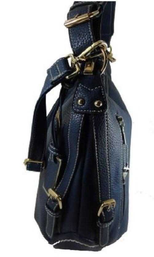 A black vegan leather concealed handbag with gold hardware.