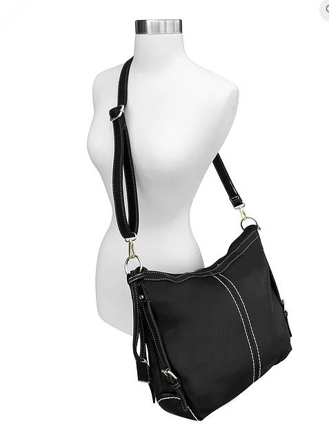 A "Lisa" Women's Black Vegan Leather Concealed Handbag on a mannequin.