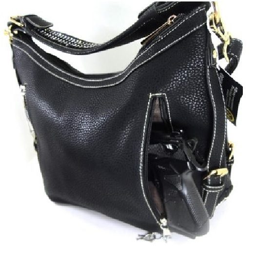 A "Lisa" Women's Black Vegan Leather Concealed Handbag with a gun in it.