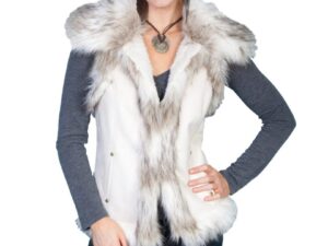 A woman wearing a Womens Scully Faux Suede, Off White Fur Western Vest.