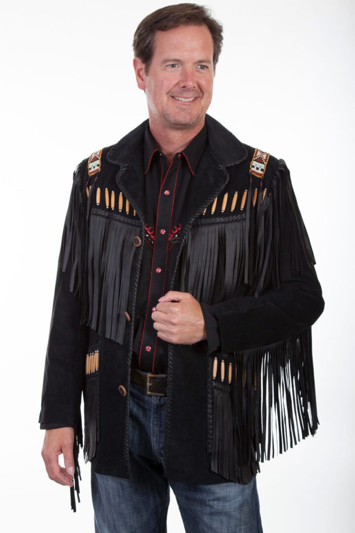 A man wearing a Scully Mens Black Boar Suede Native Bone Fringe Jacket.