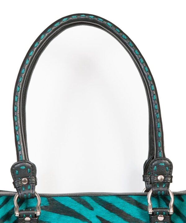 A Womens Scully Turquoise Hair on Hide Black Zebra print handbag with black and turquoise accents.
