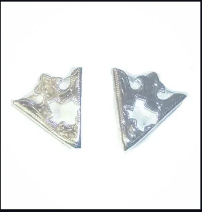 A pair of "Texas Pride" Sterling silver Shirt collar tips on a white surface.